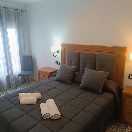 Al-Qazeres Suites Caces Buitenkant foto
