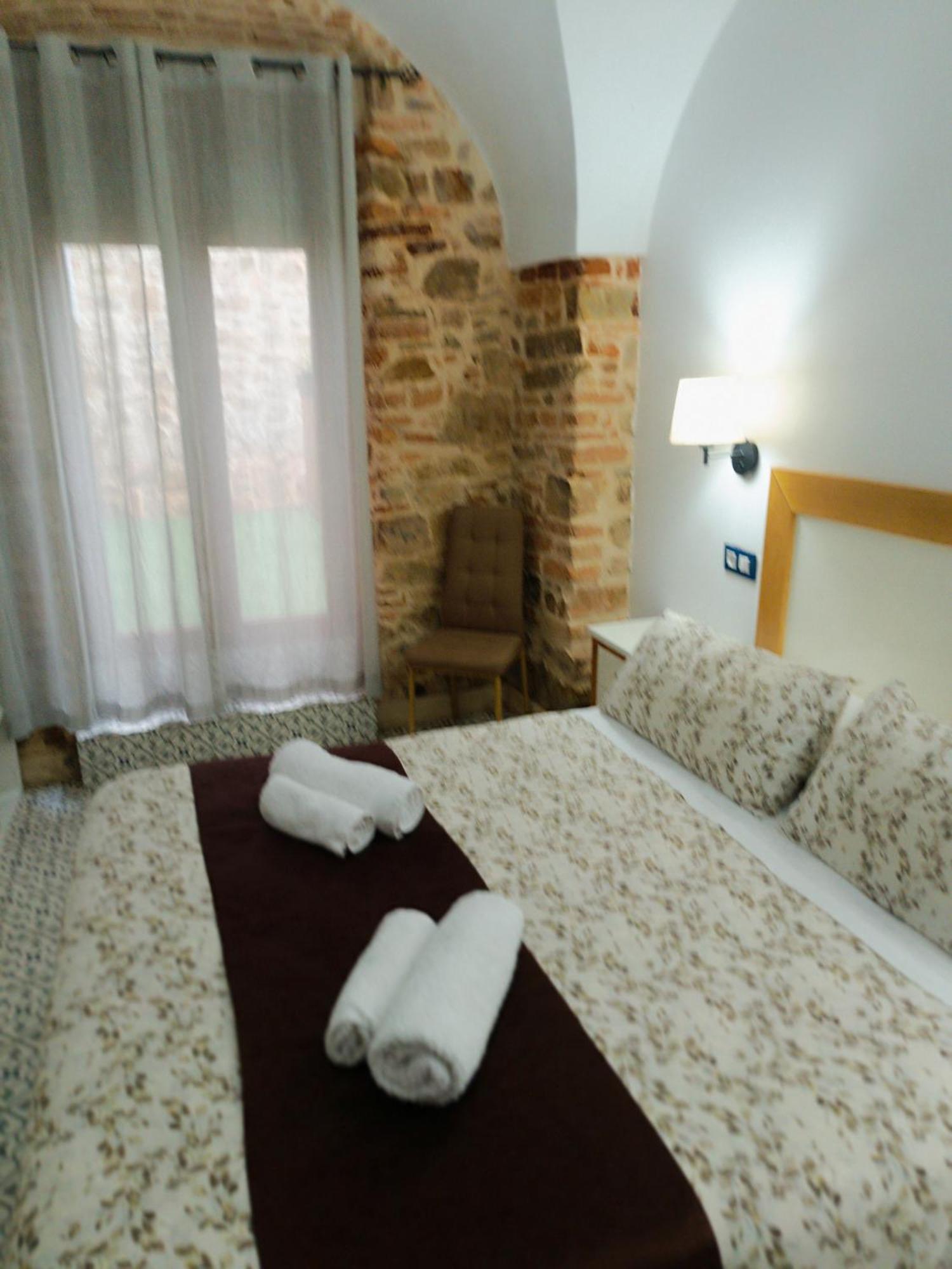 Al-Qazeres Suites Caces Buitenkant foto